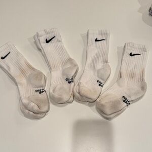 Boys Nike socks, youth small, play condition (4 pairs) 2 pairs very clean!